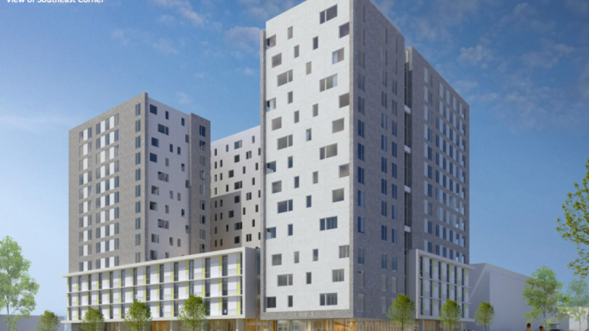 This image shows a proposed 14-story apartment building at Assembly and Washington streets next to the Richland County library in downtown Columbia