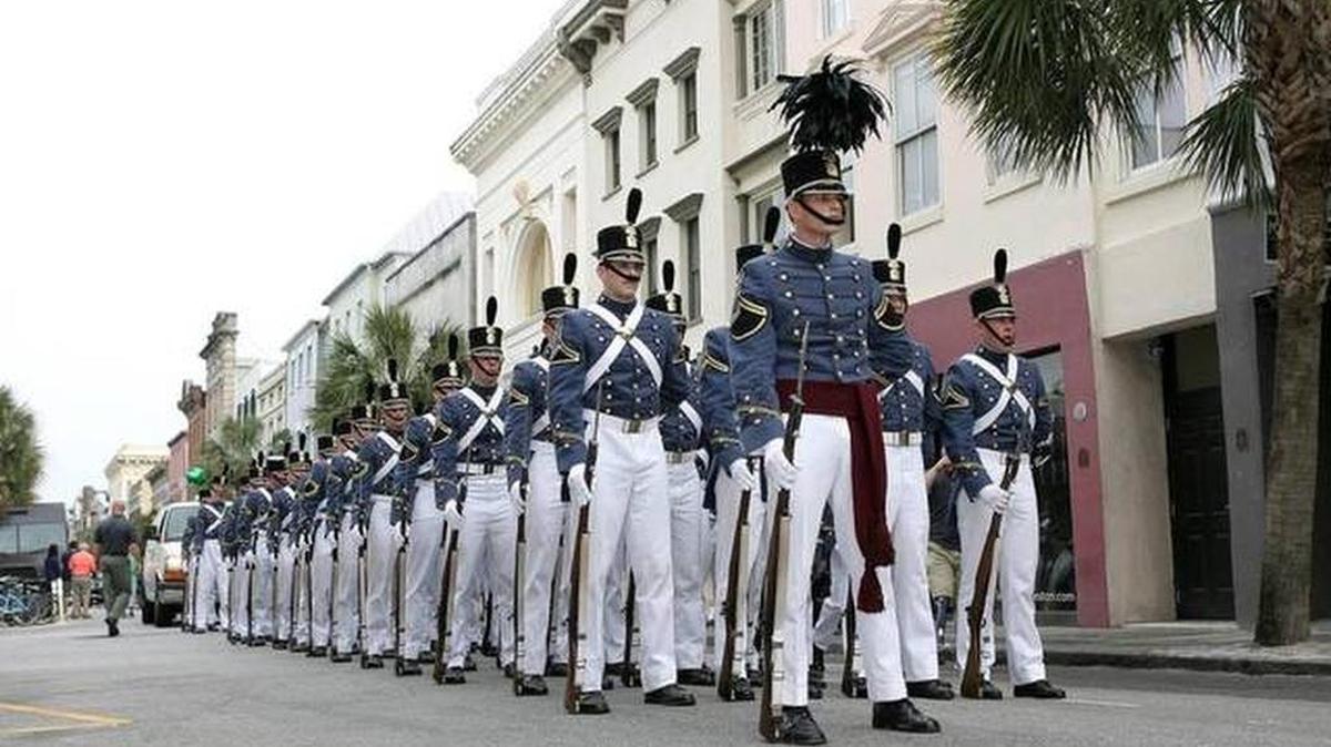 Members of the 2017 Summerall Guards stand at parade rest during the St. Patricks Day Parade in downtown Charleston last March.