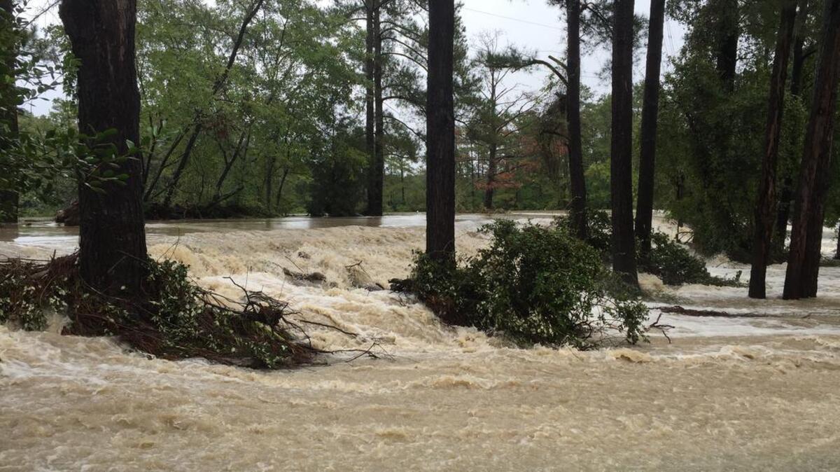 Failing dams can release a deluge of water, as is pictured here from a 2015 flood in Columbia.