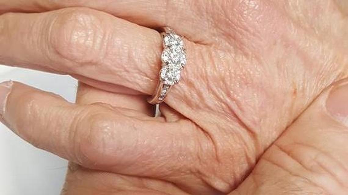 Denise Massey, one of eight people shot in the Vista early September 16, shows off her engagement ring.