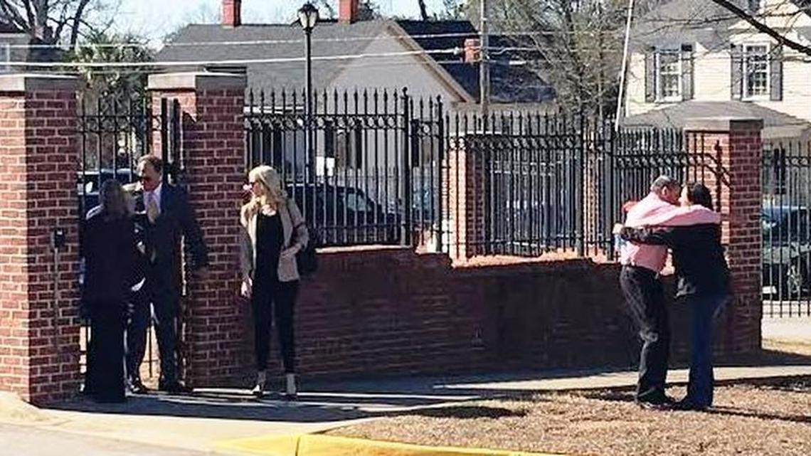 Greg Leon is hugged by a relative after being released from jail by a federal judge.