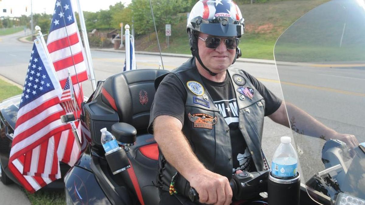 
Harvey Mayhill rolled into Fort Mill at Veterans Park. Mayhill made a 24-hour, three-stop trip Friday to honor POW/MIA military.
