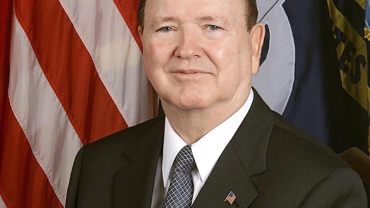 The Honorable Hansford T. Johnson, Secretary of the Navy (Acting).