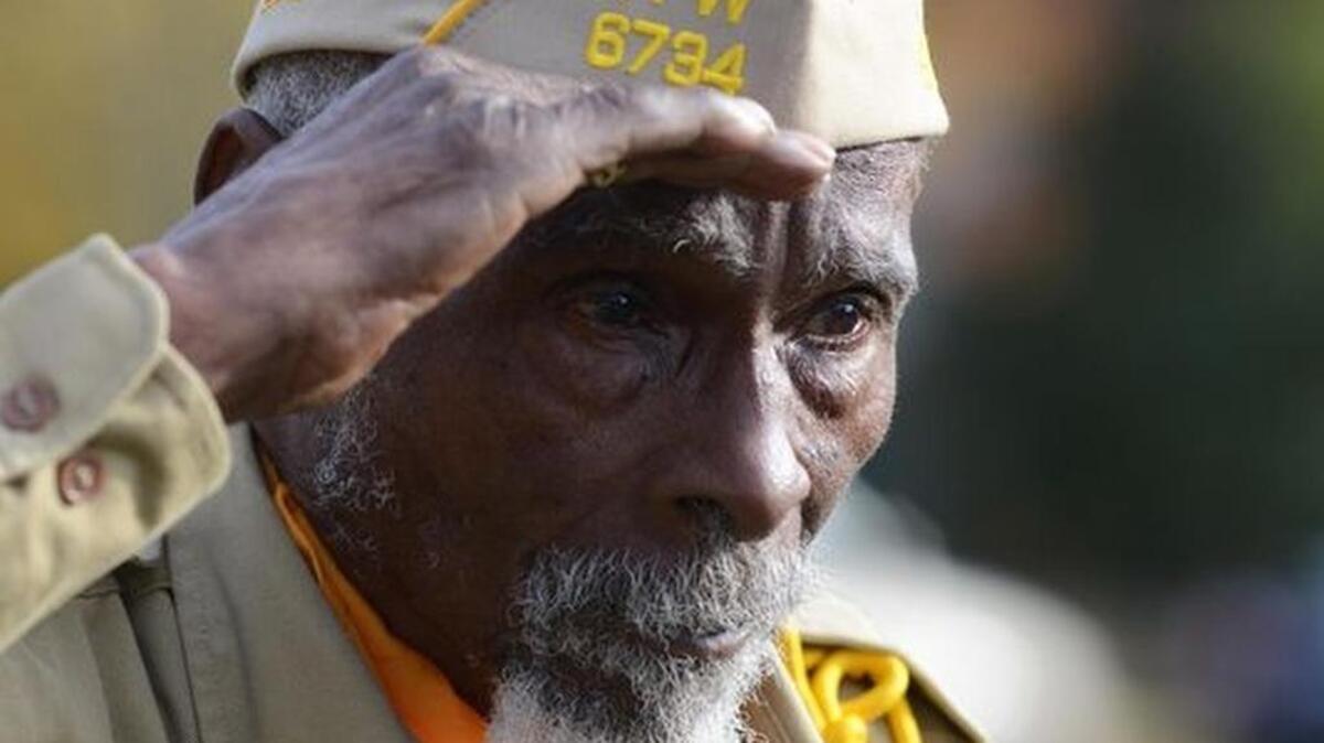 Tomie Gaines, one of the Buffalo Soldiers, attends a Veterans Day Ceremony at historic Richland Cemetery on Sunday, November 11, 2012.