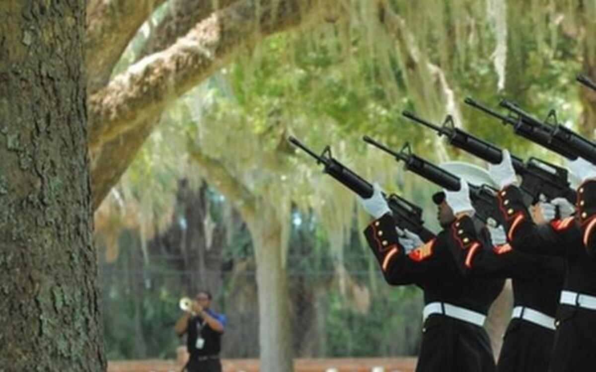 
A detachment of Marines fires a 21-gun salute at the conclusion of a 2011 Memorial Day Ceremony at the Beaufort National Cemetery. 
