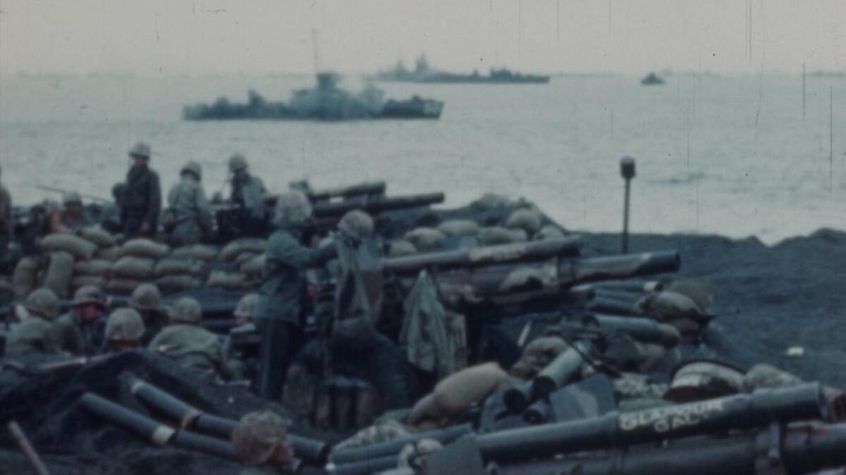 This photo provided by the University of South Carolina shows a scene from the Battle of Iowa Jima, recorded by the U.S. Marine Corps in 1945.