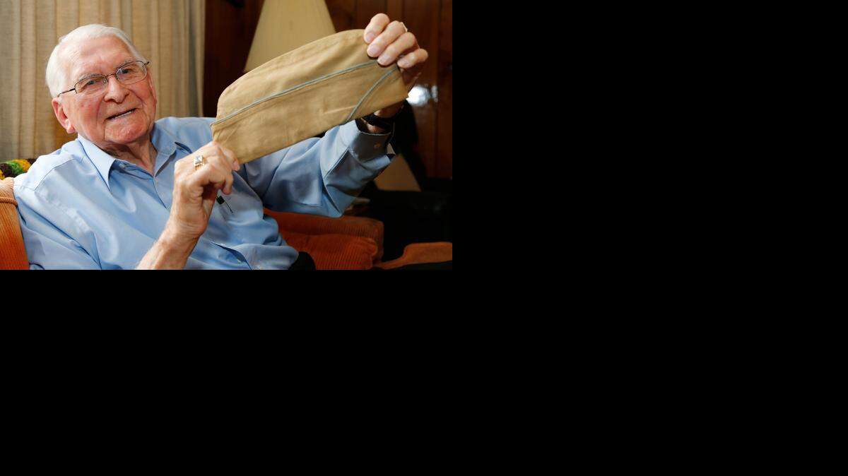 
Raburn Miller, 99, of Rock Hill was at the battle of Iwo Jima. This is the 70th anniversary of the battle of Iwo Jima. The battle ended on March 26. Raburn shows the cap from his Army uniform. 
