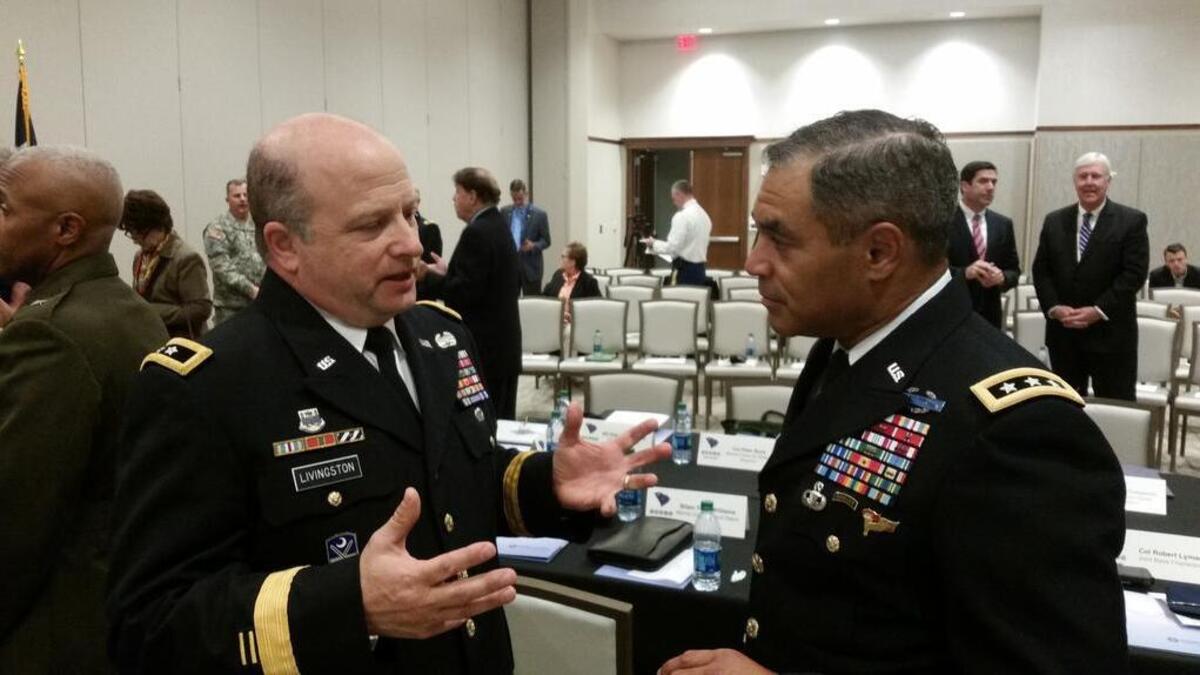 Maj. Gen. Robert Livingston, left, South Carolina’s adjutant general, talks with Lt. Gen. Michael Garrett, commander of U.S. Army Central, at a briefing with Gov. Nikki Haley on Wednesday.
