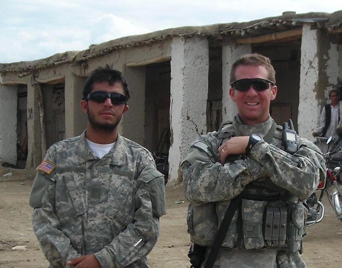 James Smith poses with his Afghan interpreter during his 2007-08 tour of Afghanistan with the S.C. National Guard. Smith credits his translator’s language skills with saving his life.