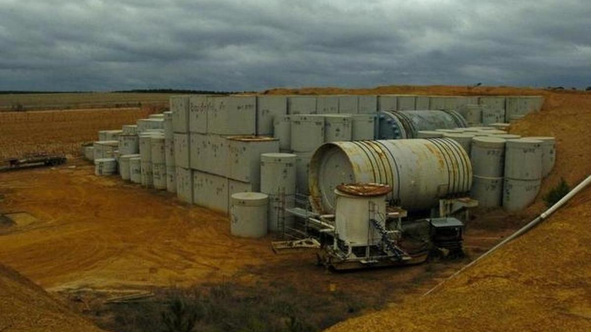 
Low-level nuclear waste is buried in unlined trenches at the Barnwell County atomic refuse dump, which has leaked tritium into groundwater.
