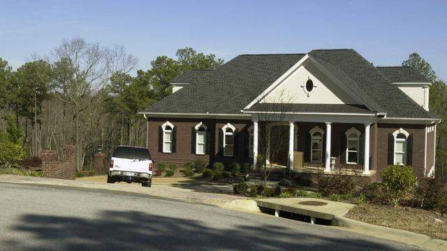USC football coach Steve Spurrier’s house, shown here soon after he purchased it, is expected to again be on the market soon.