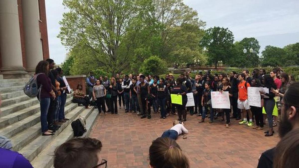 Students gather in front of Sikes Hall as part of a protest against racism on campus.