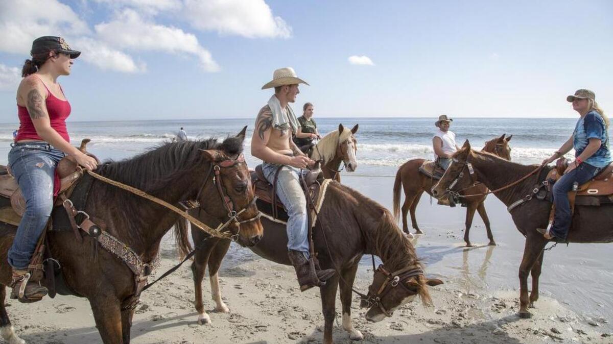 Riders in the AHA Beach Ride gather in downtown Myrtle Beach. The American Heart Association 34th Annual Beach Ride drew over 2,000 horses and riders for the five-day event.