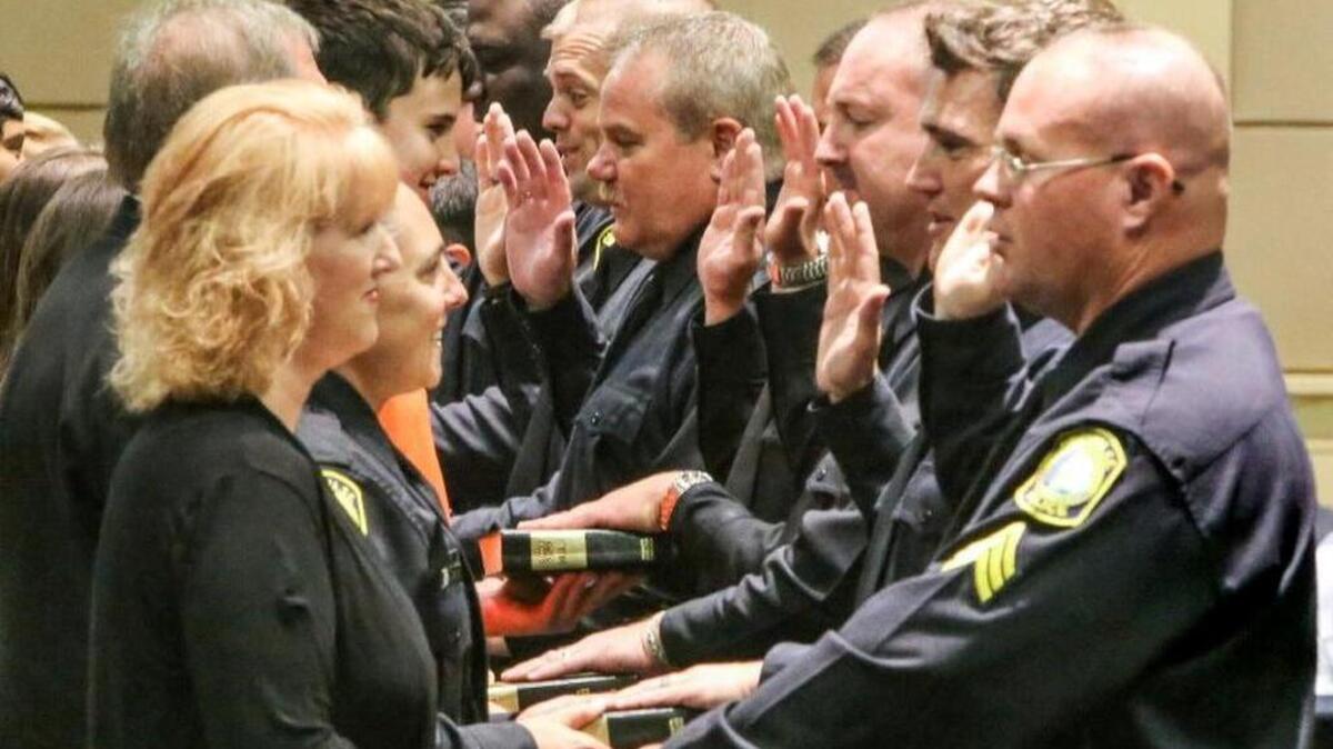More than 50 Columbia police officers were promoted during a ceremony at the Columbia Metropolitan Convention Center. Chief Skip Holbrook speaks during the ceremony.
