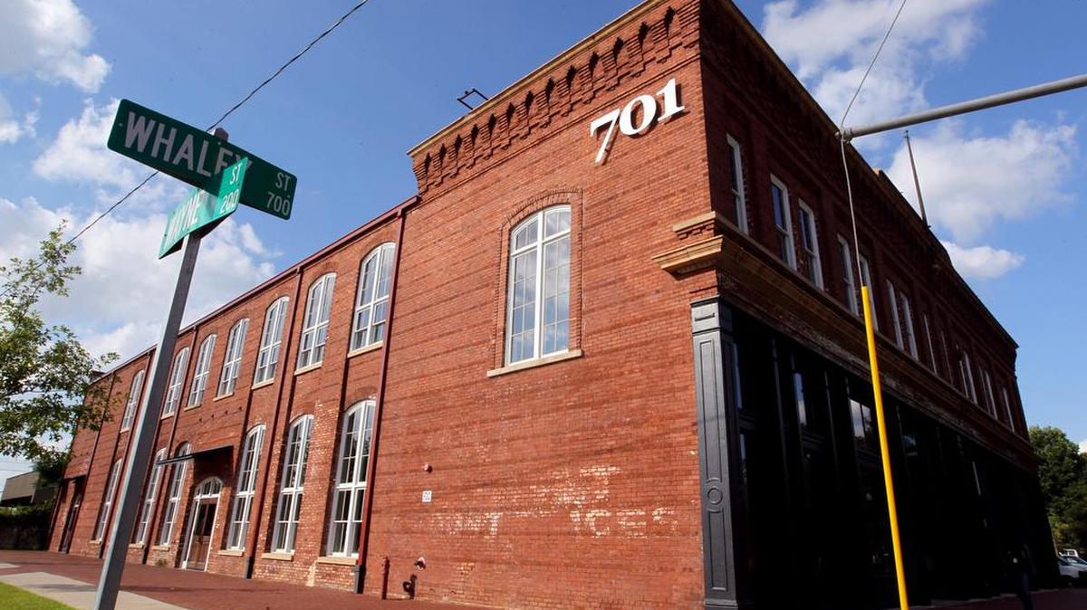 A renovated 701 Whaley, with its office, living and event spaces, once served as the community center for the Olympia, Granby and Whaley mill villages.