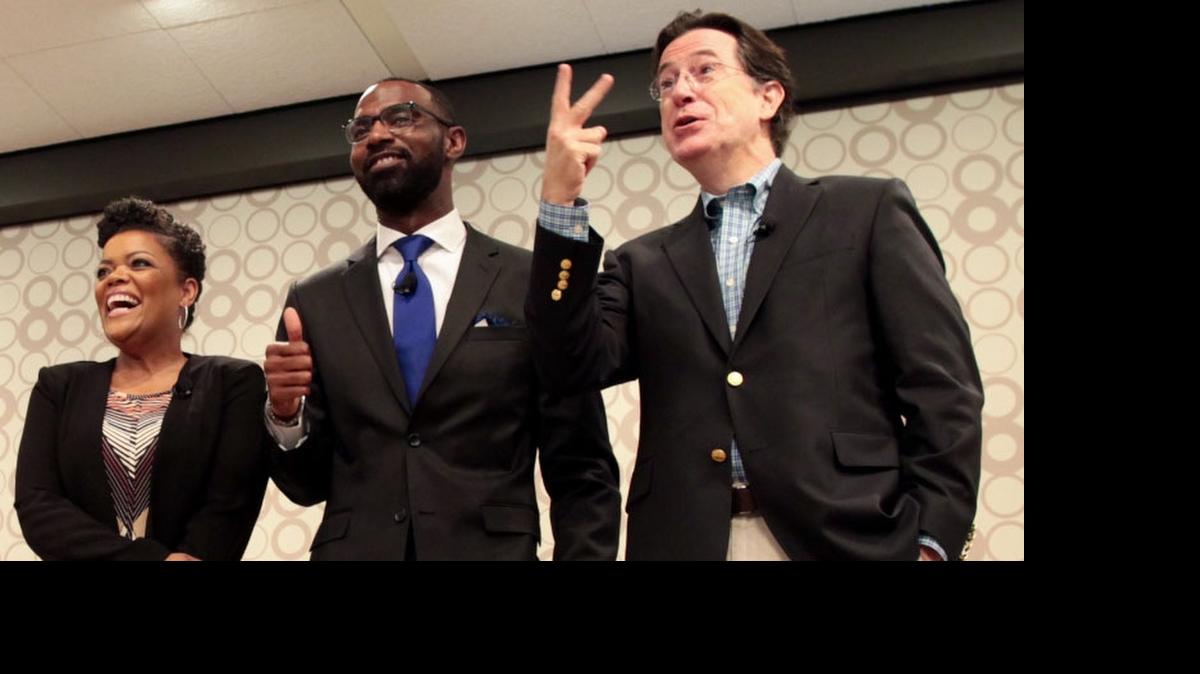
Stephen Colbert surprised Greenville, SC, Alexander Elementary School teacher Damon Qualls Thursday announcing he’s helping to Flash Fund every project in South Carolina posted on DonorsChoose.org. (Pictured left to right: actress Yvette Nicole Brown, Damon Qualls, Stephen Colbert)
