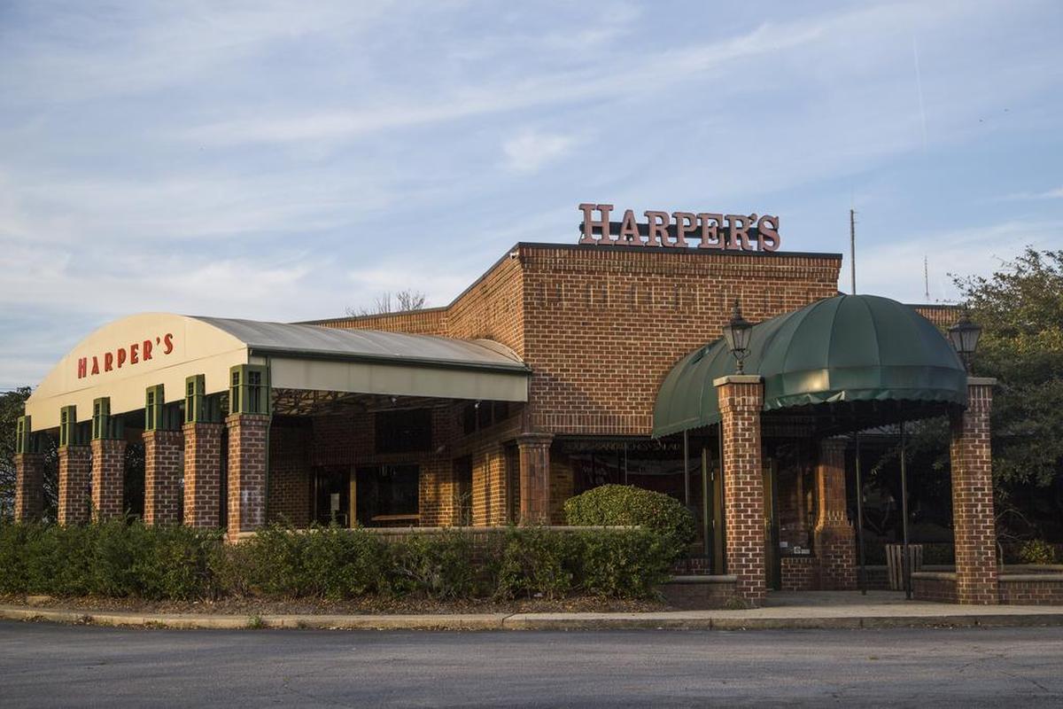 The former Harper's Restaurant remains empty after it closed last year. Franchisees Jim and Britt Poston of Florence pursued opening a Zaxby's in the restaurant's location but was met with opposition from various groups in Five Points. Residents worried it would change the village feel of the neighborhood.