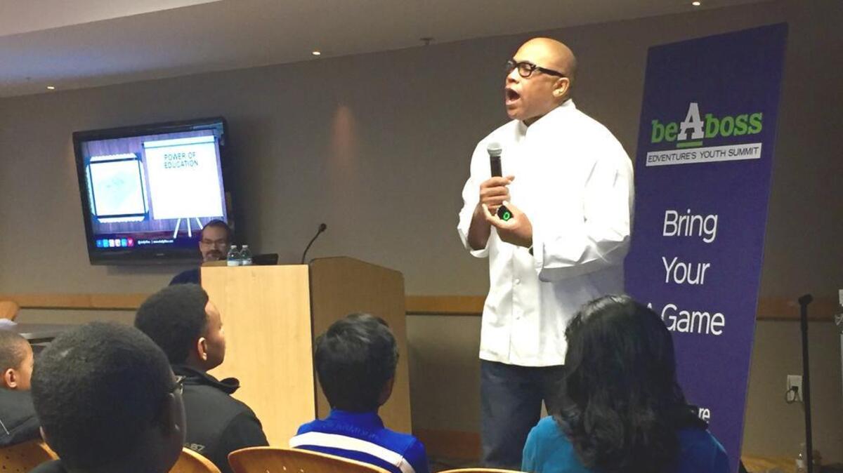 Celebrity chef Jeff Henderson speaks to middle schoolers at EdVenture’s “Be A Boss” youth summit Saturday.
