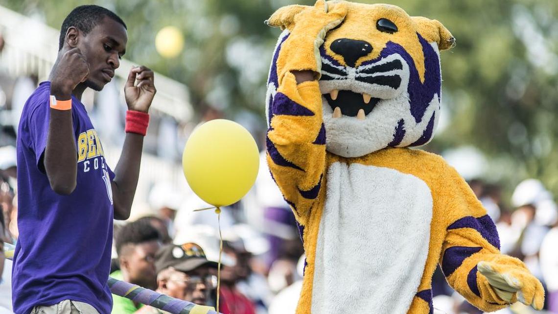 
A Benedict fan dances with the Tiger Saturday evening at Charlie W. Johnson Stadium during the game against Livingstone College. 
The Benedict College Tigers took on the Livingstone College Blue Bears on Saturday, but not before just about everyone but the players took on some tailgating.
The annual Palmetto Capital City Classic isn’t just about football, although the fans, for a while, anyway, might think it is. 
Alumni, students and FOBs (Friends of Benedict) also found ways to socialize all week in events leading up to the game, with the Drumline performance, the Garnell McDonald Memorial Golf Tournament, an alumni mixer and the R&B Ole School Funk Fest attracting crowds almost every day.

