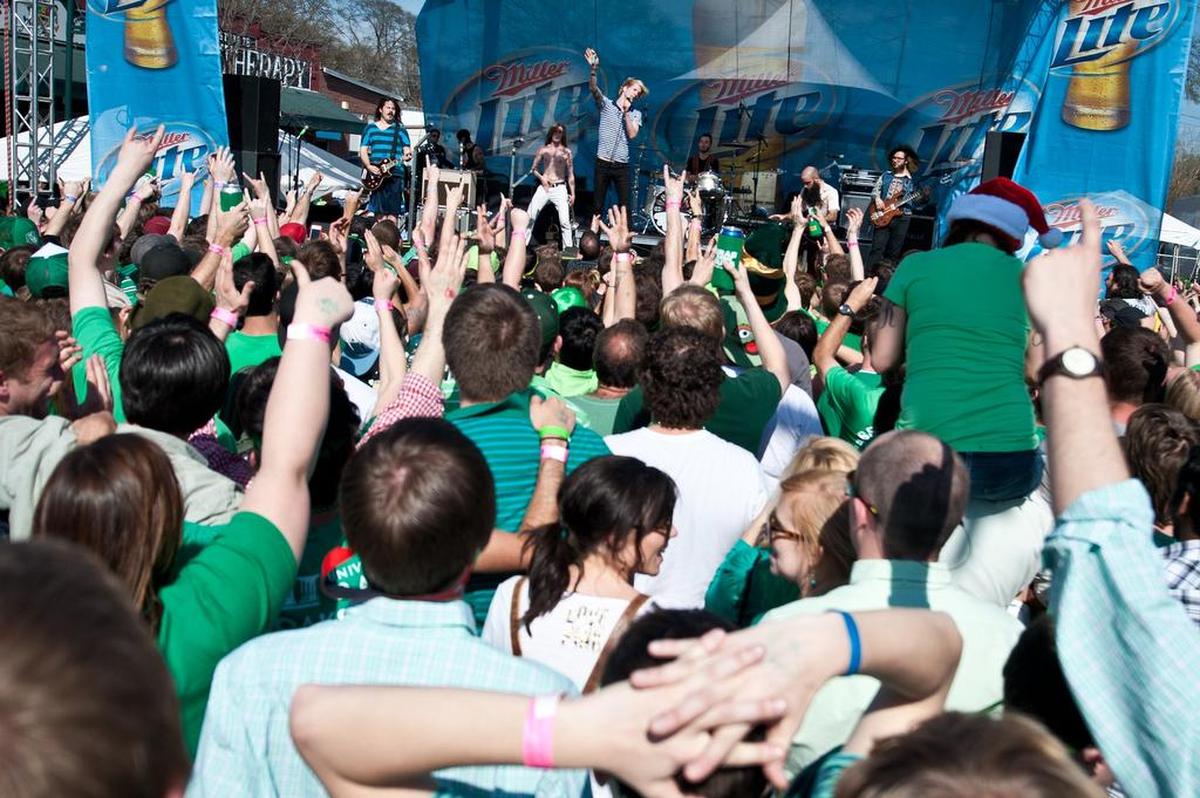 The crowd listens to a band at a past St. Pat’s in Five Points.