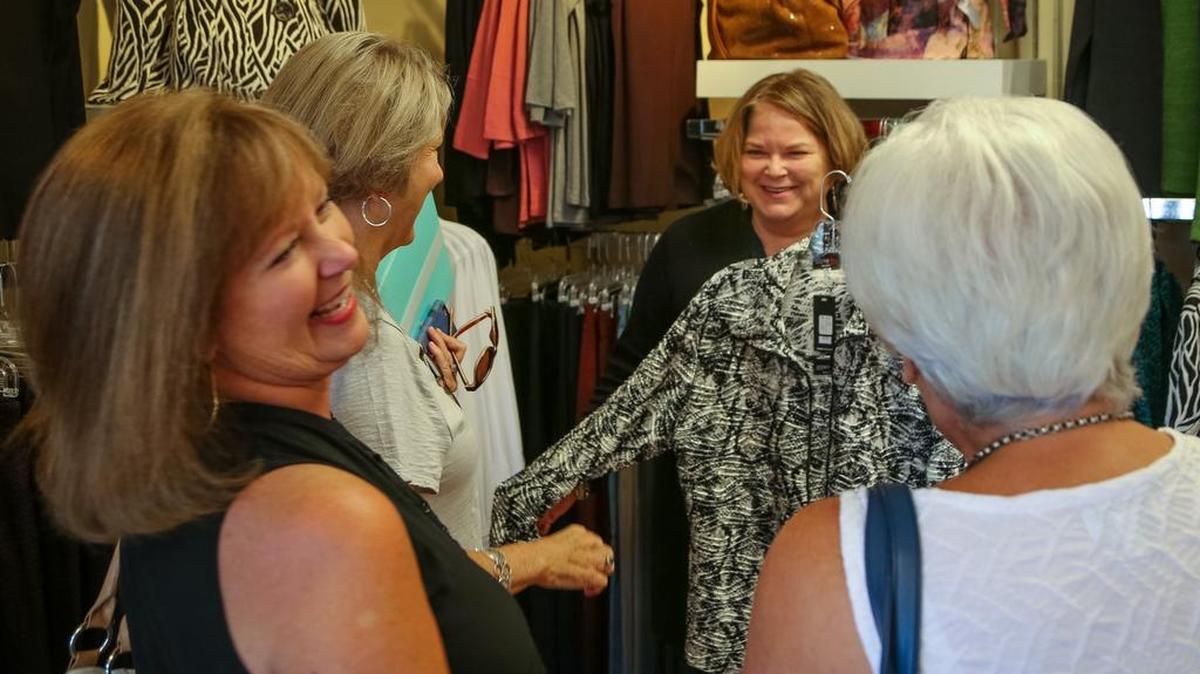 Stacy Levinson, second from right, who has been in the clothing business with her parents and then brother since she was 2 years old, has taken over sole ownership local clothier Britton's.
