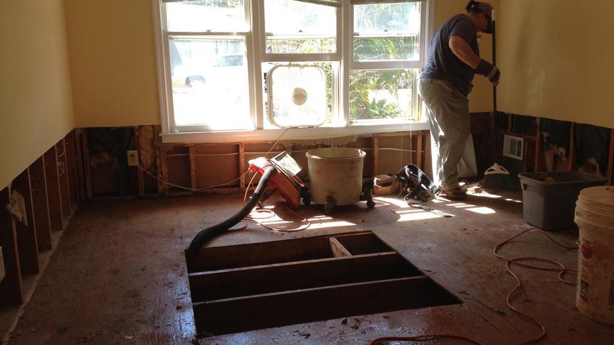 
Arlan Brady took off work Thursday to help clean up the flood-damaged home of Sharon Funderburk in the Coldstream neighborhood near Irmo.
