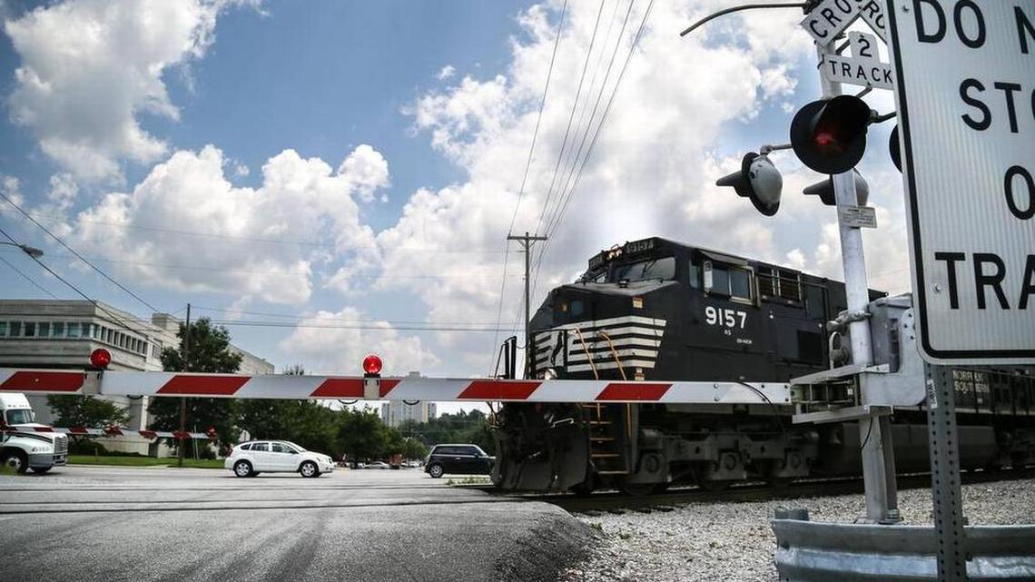 A train crosses Assembly Street.