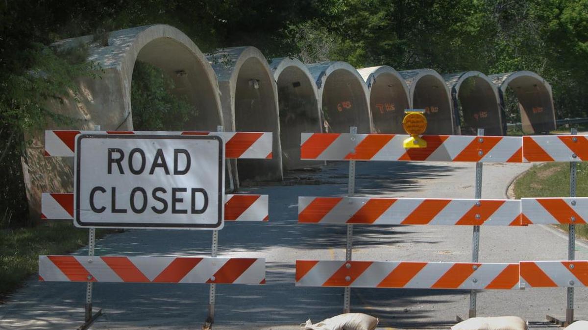 The bridge over Lost Creek Road near Harbison State Forest was damaged during October flooding. Residents using a main access road too and from their neighborhood have been using a detour, adding up to 30-minutes to their one-way commute. Concrete culverts damaged in the flood sit on Lost Creek Road.