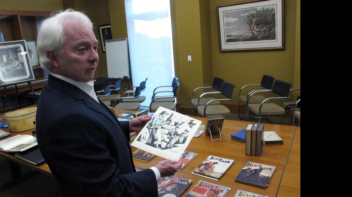 
In this May 18, 2015 photo, Dashiell Hammett biographer Richard Layman shows a drawing by Hammett at the University of South Carolina, in Columbia, S.C. The university is being given thousands of letters, photos and publications of the late crime fiction author. 
