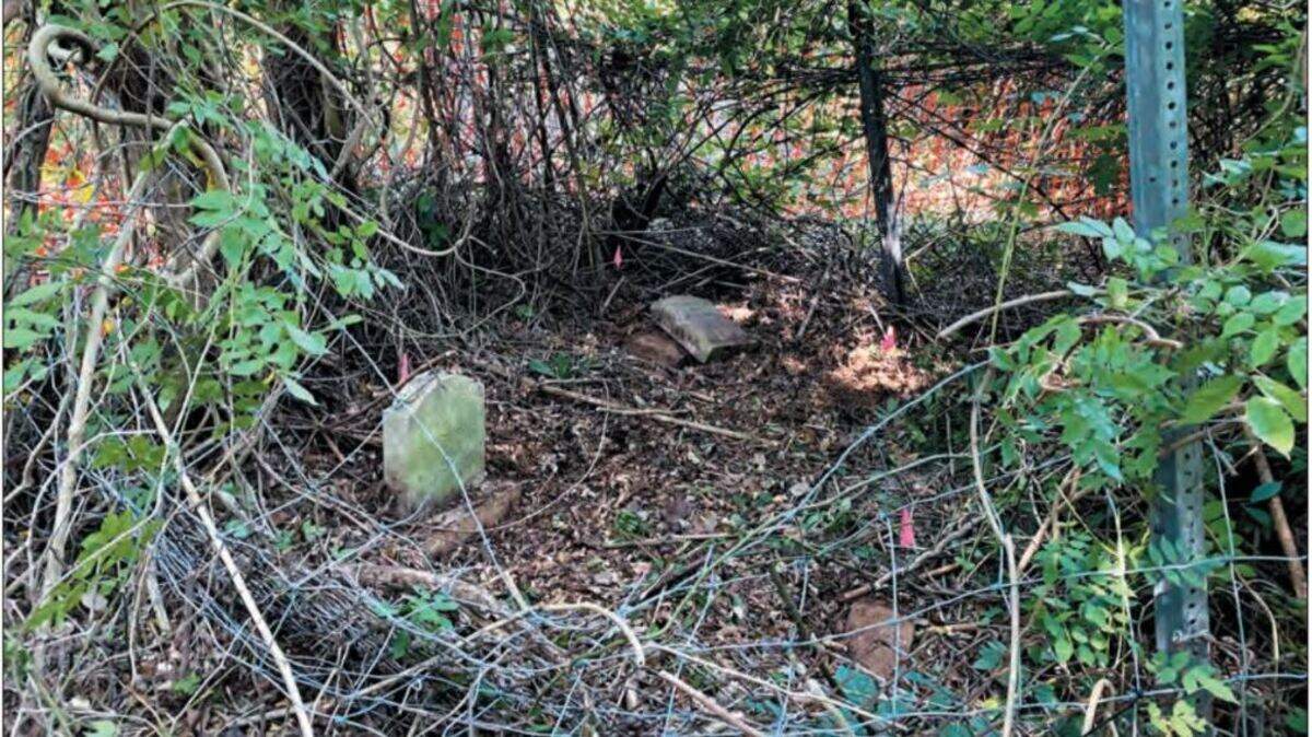 Two graves in the Stack family cemetery near Chapin. The SC Department of Transportation is trying to locate family tied to the site before remains are moved to make way for a widening of Interstate 26.