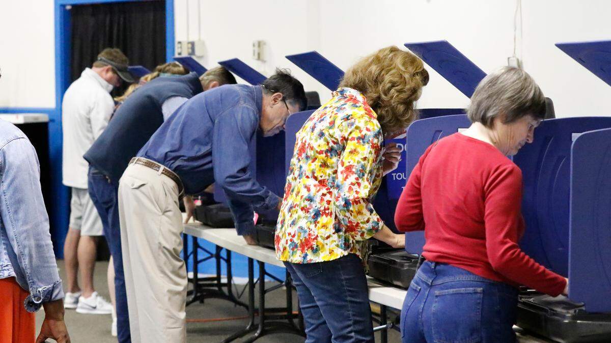 Voters cast their ballots at A.C. Moore Elementary School in Columbia, SC, on Tuesday, Nov. 6, 2018. The Richland County elections director said they have received reports of the votes on people’s ballots changing because of a calibration issue.