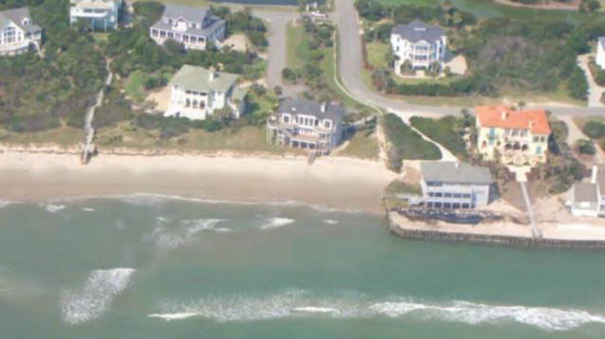 Part of a seawall that juts into the ocean at Debordieu Beach, S.C.,  was to be replaced several years ago after the state Legislature changed a quarter century of coastal law to allow for construction of the wall.