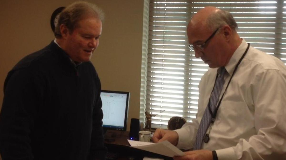 Chapin Mayor Skip Wilson, right, discusses matters with town utilities director Andy Metts.