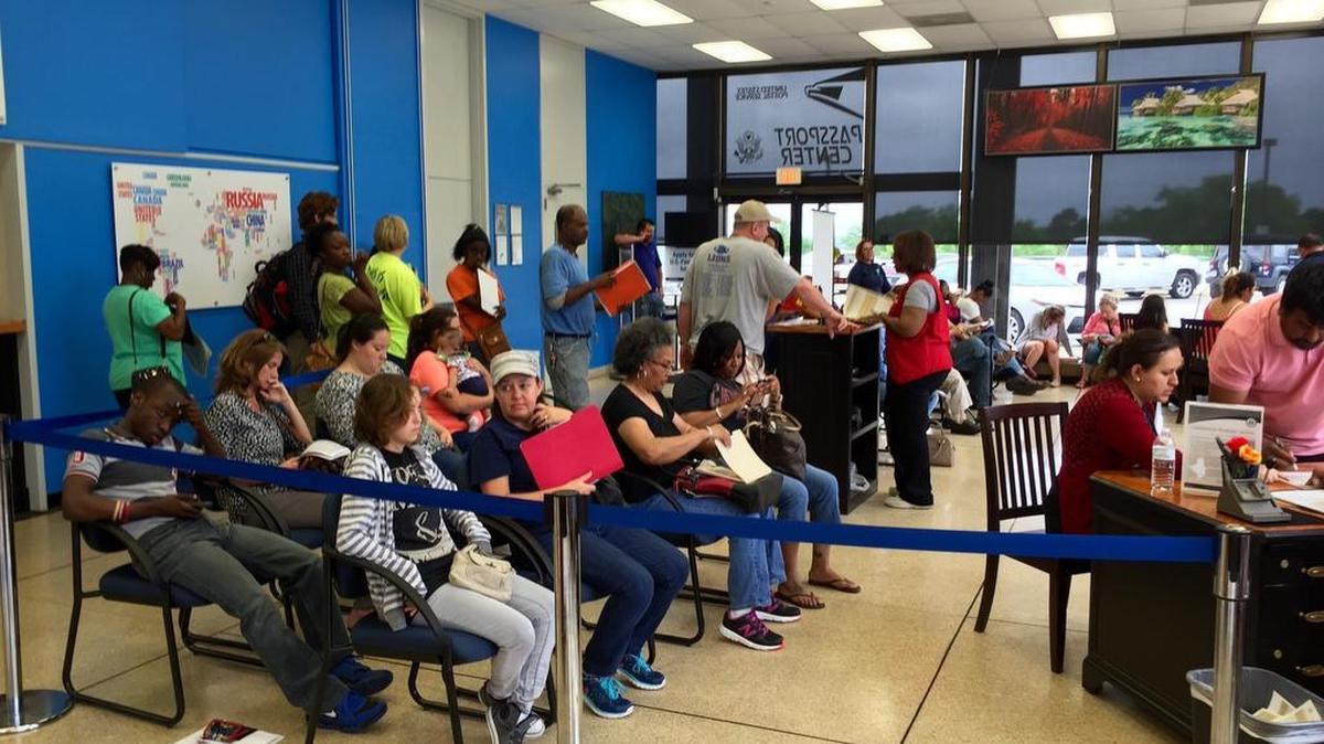 Several dozen people waited to apply for passports at the downtown Columbia post office Friday afternoon. The combination of spring break for students and a narrowing timeline before summer trips apparently led to the crush of customers.