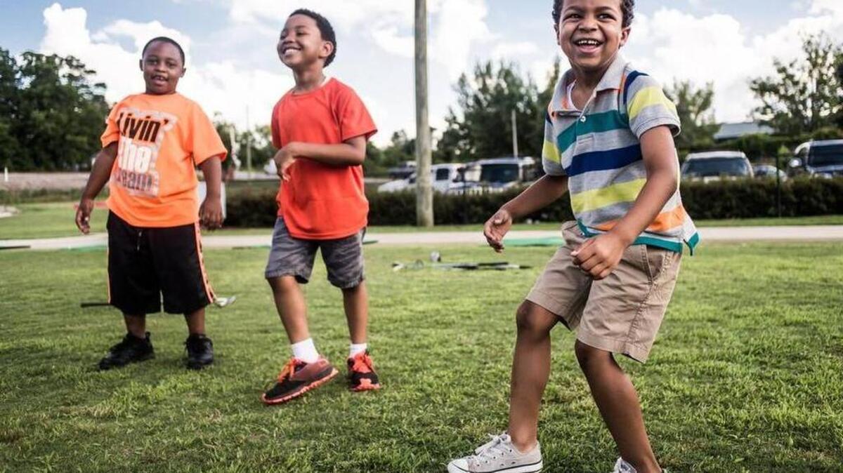 FILE - Caden Brennan laughs during warm-ups at the First Tee of Columbia first Summer Golf Session in June 2015 at the James E. Clyburn Golf Center in Columbia.