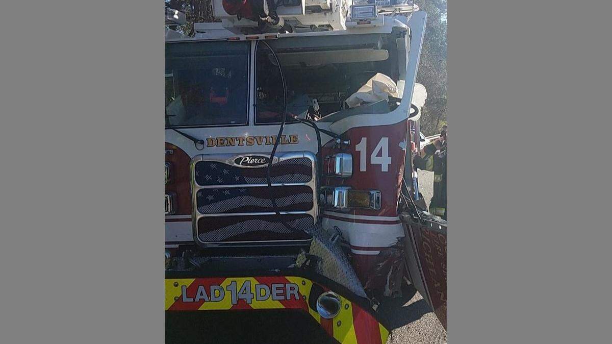 A Columbia Fire Department ladder truck was hit by a tractor-trailer while the firefighters responded to another crash on Interstate 20 Wednesday morning.