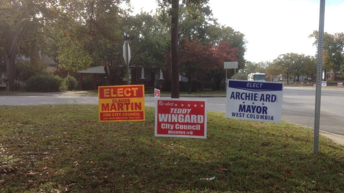 Streets in West Columbia are lined with signs promoting candidates in Tuesday’s election.