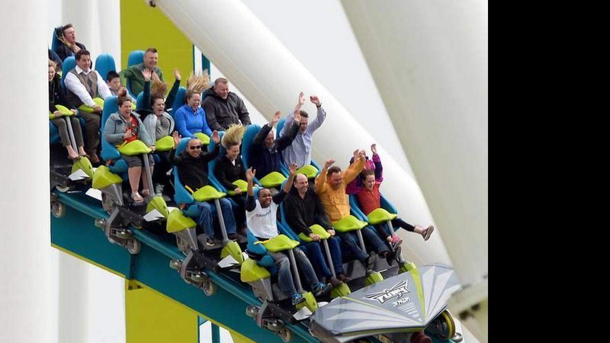 
Roller coaster riders enjoy their experience on Carowinds' new Fury 325, the world tallest and fastest giga coaster, during media day on Wednesday.
