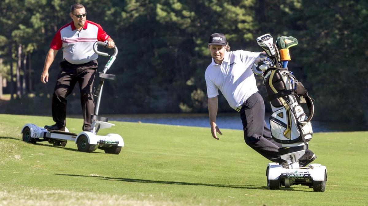 Todd Barlow of GolfBoard and Bart Romano head pro of True Blue, demonstrate the GolfBoard. True Blue Golf Club in Pawleys Island will be the first golf course on the Grand Strand to use GolfBoards. Like the hybrid of a skateboard, surfboard and snowboard made for a golf course, players can use it in place of a golf cart. It has space for a golf bag on the front and a user changes direction by shifting weight. True Blue has initially purchased four GolfBoards; they can be used for $29 a player.