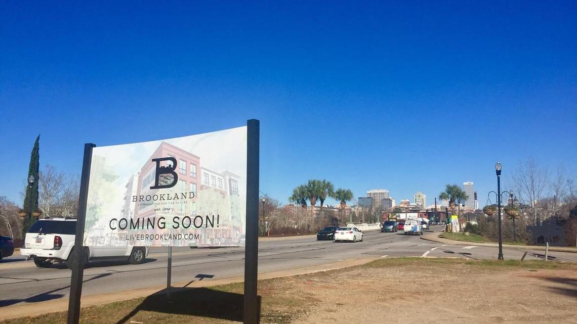 The new Brookland development in West Columbia will contain up to 235 apartments and condominiums as well as stores, restaurants and offices in multi-story buildings overlooking the Congaree River a block east.