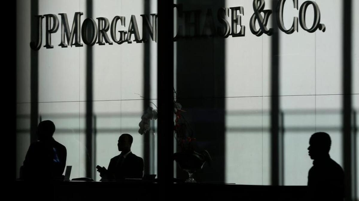 The JPMorgan Chase & Co. logo is displayed at the company’s headquarters in New York. In a massive policy shift, the Republican Party has adopted a platform position advocating for the reinstatement of the Glass-Steagall Act of 1933, a Great Depression-era law that regulated the U.S. banking industry until it was repealed in 1999.