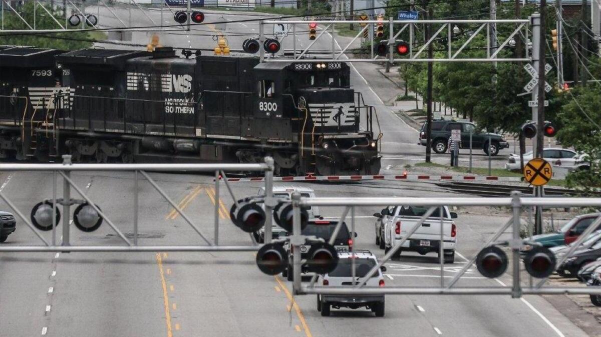CSX and Norfolk Southern plan to keep trains running during a solar eclipse Monday despite predictions of heavy traffic.