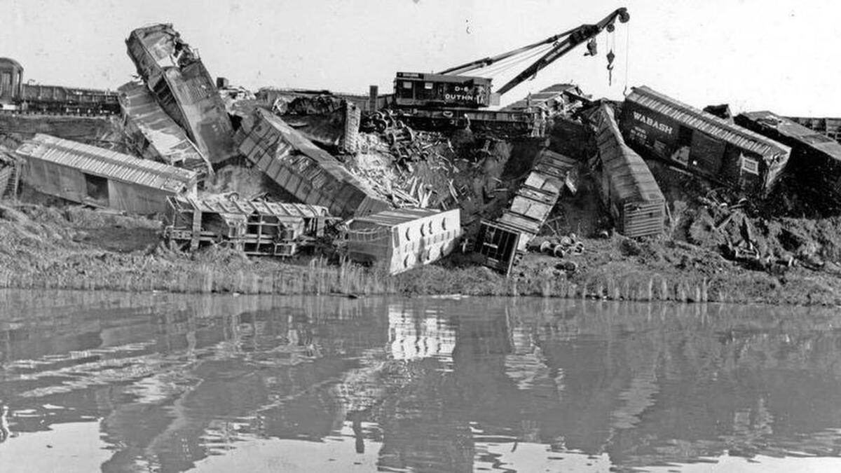 Train cars are piled up after 1965 wreck.