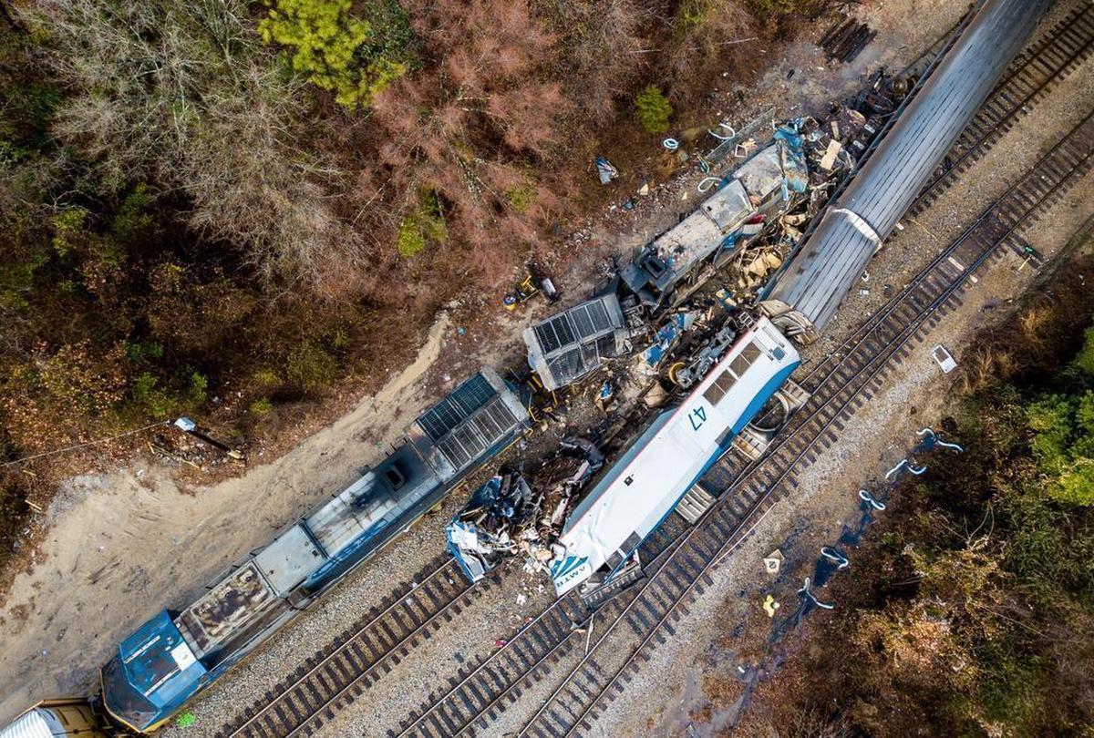 An aerial view of the site of an early morning train crash Sunday, Feb. 4, 2018 between an Amtrak train, bottom right, and a CSX freight train, top left, in Cayce, SC. The Amtrak passenger train slammed into a freight train in the early morning darkness Sunday, killing at least two Amtrak crew members and injuring more than 110 people, authorities said.