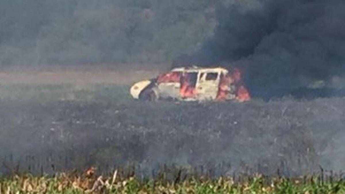 
A van loaded with live ammunition burned in a field in Clay County on Tuesday after a man failed to put out a garbage fire by driving over it. 
