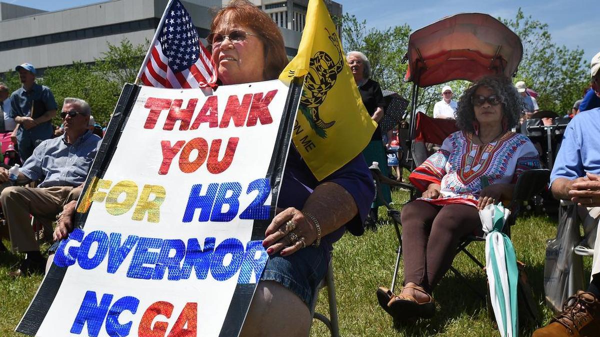 Lee Churchill, of Raleigh, shows her support of HB2 during a rally on the Halifax Mall in Monday, April 25, 2016.