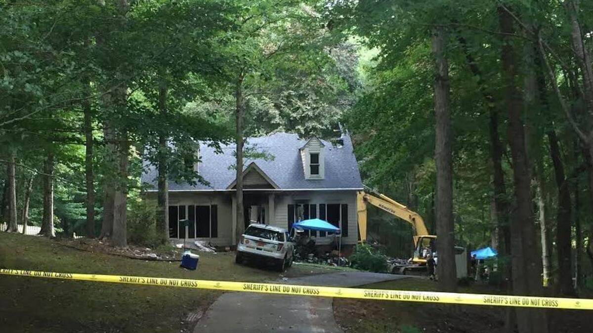 Authorities continue to work Tuesday at the scene of Monday’s fatal fire. The victim has not been identified. The fire was at the home of former Union County prosecutor Anne Reeves, who remains unaccounted for.