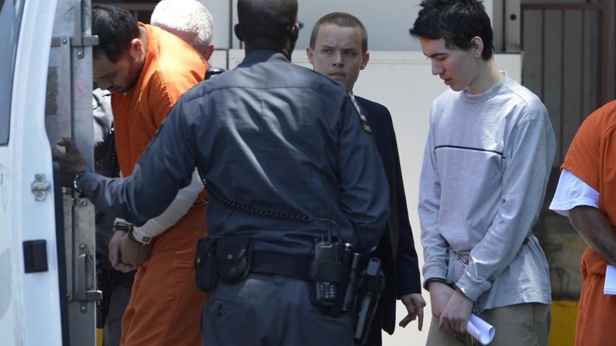 Justin Nojan Sullivan, 19, exits the Federal courthouse in Charlotte Monday afternoon, June 22, 2015. Federal authorities say he tried to buy a semi-automatic rifle last week at the Hickory Gun Show to kill on behalf of the Islamic State, also known as ISIS or ISIL.