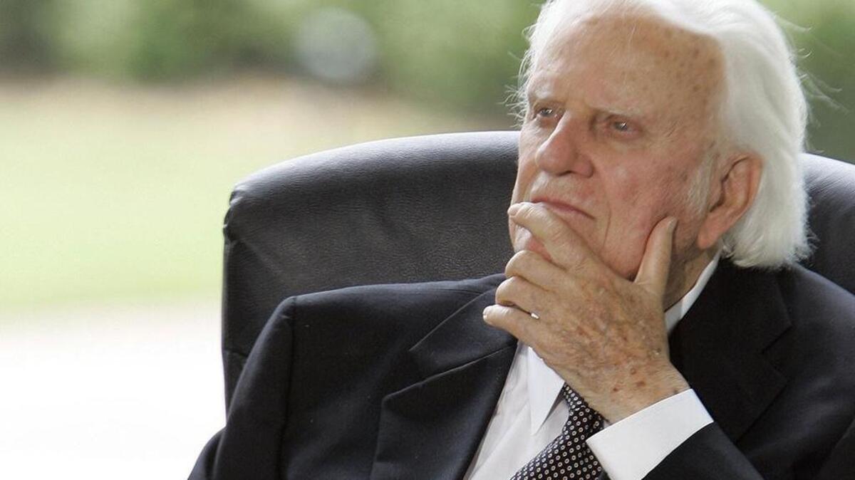 ** FILE ** In this May 31, 2007 file photo, Billy Graham listens during a dedication ceremony for the Billy Graham Library in Charlotte, N.C.