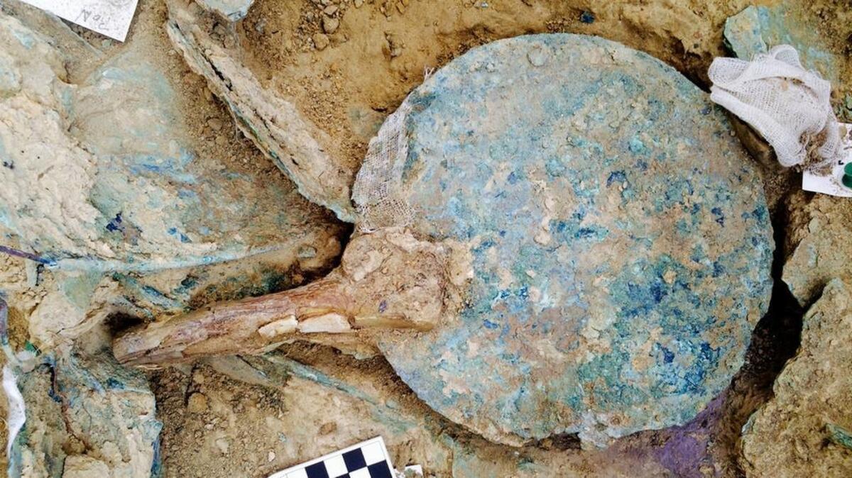 A bronze mirror with an ivory handle found in a grave of a warrior at Pylos in Greece.